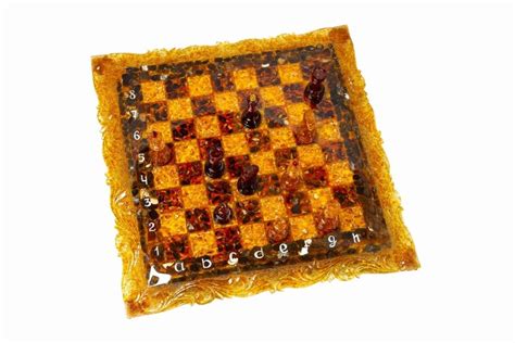 Купить Шахматы из янтаря "Резные" 48.5х48.5