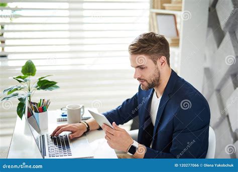 Businessman Working With Gadgets In Office Stock Photo Image Of