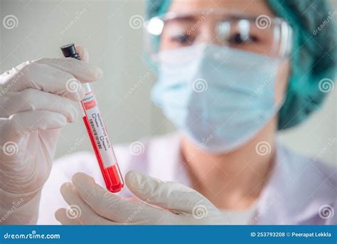 Blood Testing Laboratory Samples Viewing Under Microscope Near Tubes