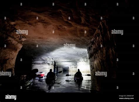 Kayaking A Abandoned Silica Mine That Is Flooded With Water Stock Photo