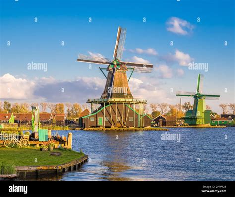 Traditional Dutch Windmills In The Rural Landscape Of Zaanse Schans