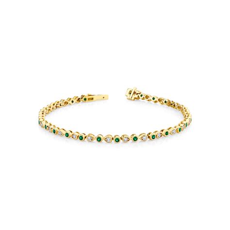 14k Yellow Gold Emerald And Diamond Bracelet Josephs Jewelers