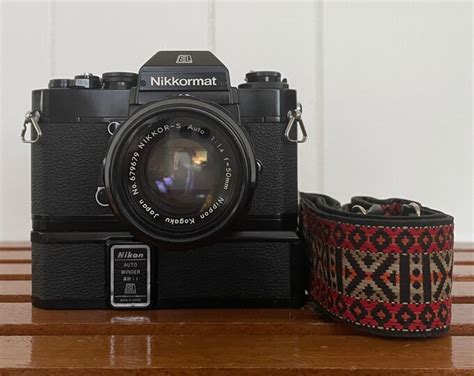 1970s Nikon Nikkormat EL 35mm SLR Camera With Nippon Kogaku Nikkor S 1