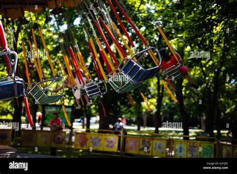 Swing Seat Carousel Exciting Ride At Amusement Park Stock Photo Alamy