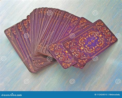 Tarot Cards Medieval Symbol Back Design On Blue Wooden Background