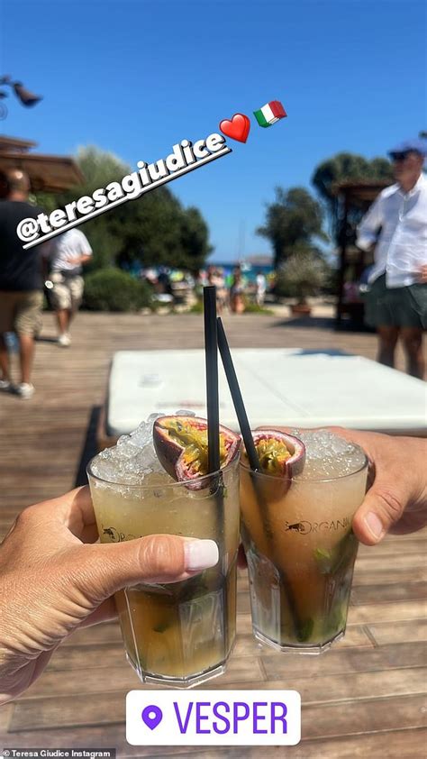 Teresa Giudice Shows Off Her Flat Tummy As She Models A Barbie Pink String Bikini For Her