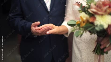 Older people holding hands. An elderly couple in love holding hands ...