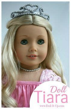 A Doll With Blonde Hair Wearing A Tiara