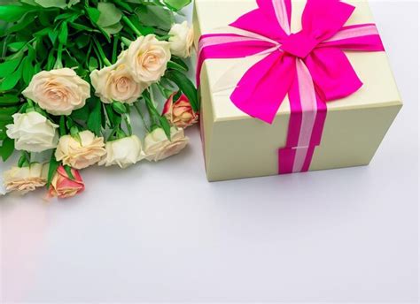 Premium AI Image | flowers and gift box isolated on white background ...