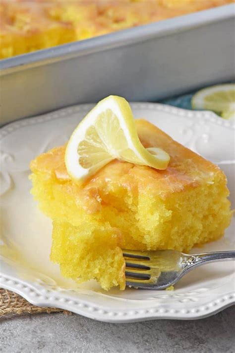 Lemon Poke Cake With Lemon Glaze Adventures Of Mel