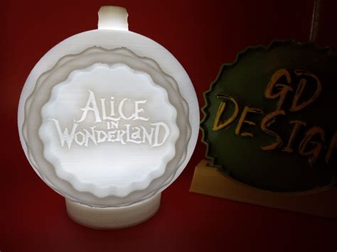 Stl File Alice In Wonderland Christmas Ornament Tealight With Twist Lock Cap・model To Download