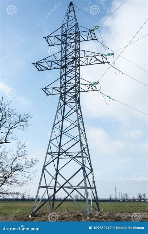 Electricity High Voltage Power Pylon And Blue Sky In Ukraine Stock