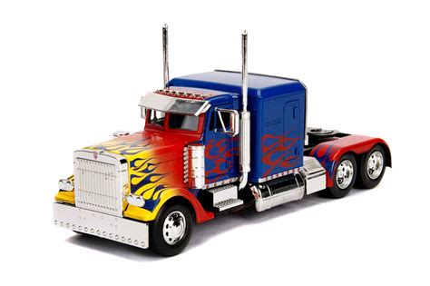 Jada Toys Transformers G1 Optimus Prime and Transformers 2007 Optimus ...