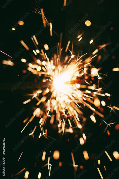 sparkler on a dark background Stock Photo | Adobe Stock