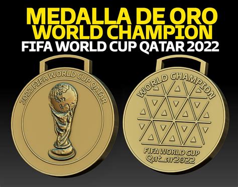 two gold medals with the words medal de oro world cup qatar