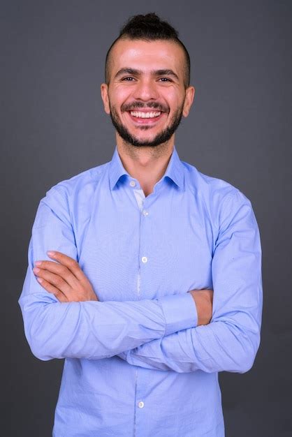 Premium Photo Portrait Of Happy Bearded Turkish Businessman Smiling