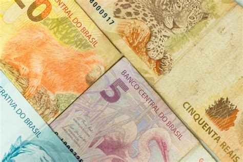 Premium Photo | Top view of brazilian real banknotes