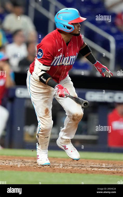 Miami Marlins' Luis Arraez watches after hitting a double to score ...