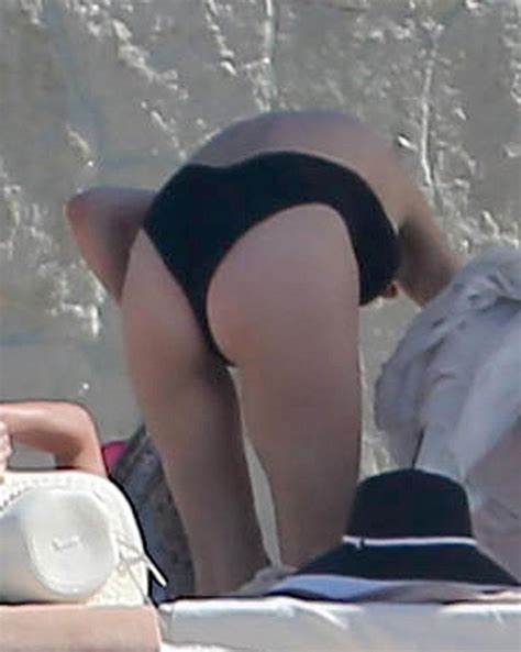 Catherine Zeta Jones Bares Her Butt Cleavage In A Plunging Bikini