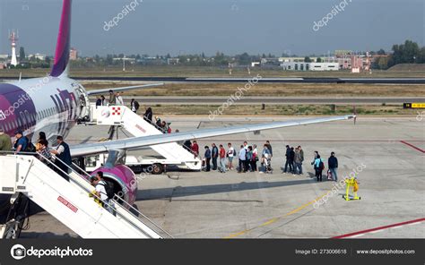 People Boarding Wizzair Jet Airplane Bologna Airport Italy Stock