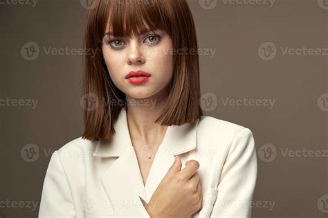 Sexy Brunette In Dress Pose For The Camera Stock Photo At Vecteezy