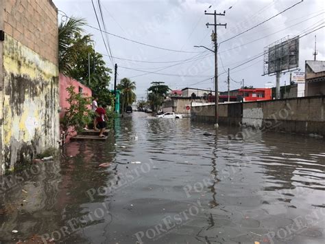 Lluvias provocan inundaciones en la Región 102 de Cancún VIDEO PorEsto