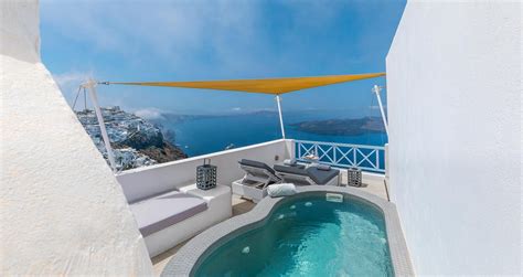 Experience Romance in our Honeymoon Jacuzzi Suite - Blue Dolphins Santorini