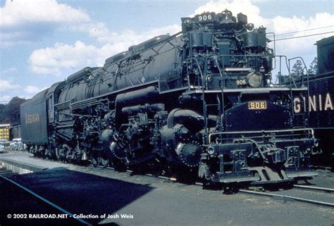 An Old Train Is Parked On The Tracks