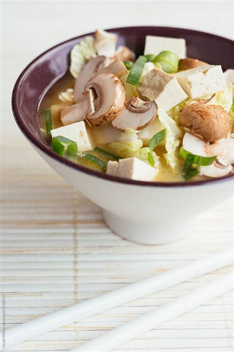 Miso Soup With Cabbage Mushrooms And Tofu By Stocksy Contributor