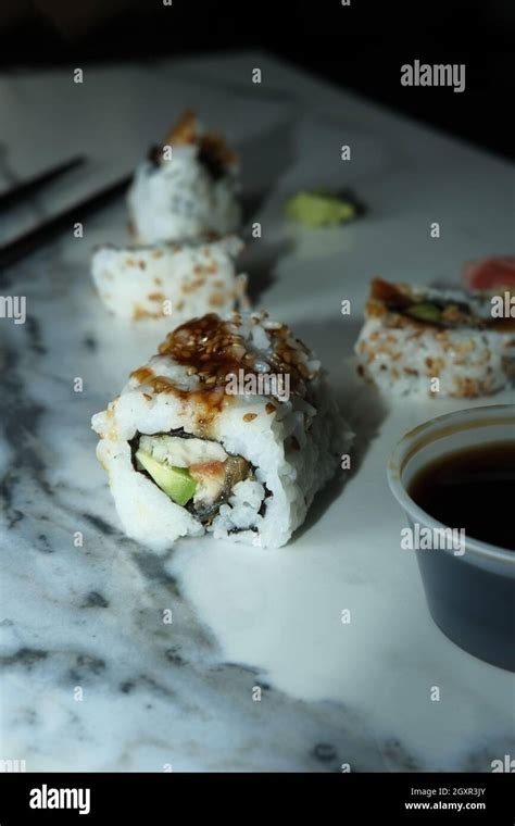 Barbecued Eel With Avocado And Cucumber Japanese Sushi Roll Stock Photo