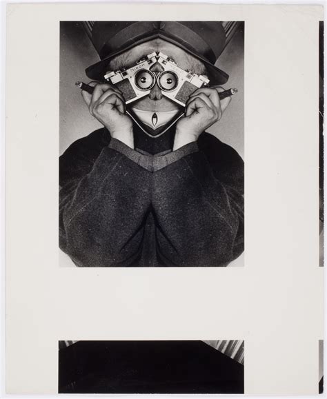 Weegee Self Portrait Holding A 35 Mm Camera And A Cigar Wearing A Hat