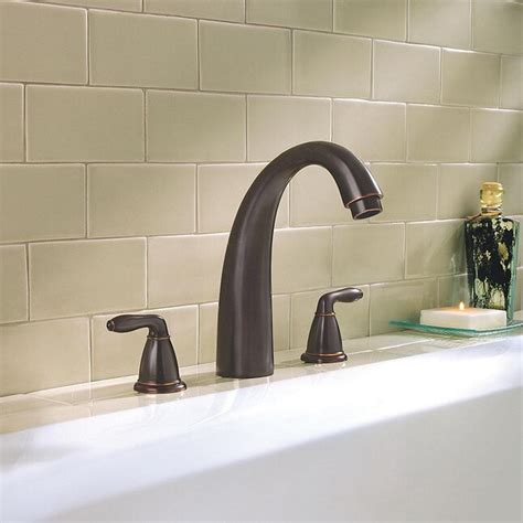 Pfister Serrano Tuscan Bronze 2 Handle Deck Mount Roman High Arc Bathtub Faucet In The Bathtub