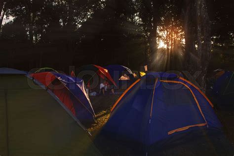 Camping at a sunset. | Stock image | Colourbox