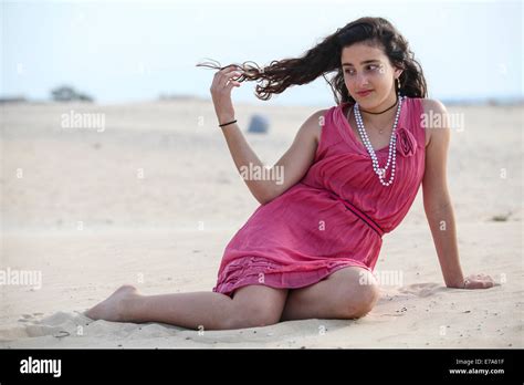 Young 12 Year Old Teen In Red Dress On The Beach Model Released Stock