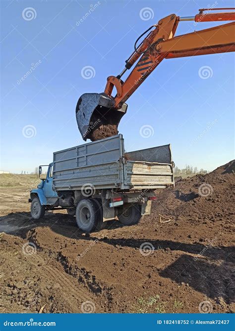 Excavator Machine Loading Soil Into Truck Body Modern Loading