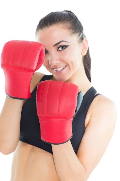 Premium Photo Joyful Brunette Woman Wearing Boxing Gloves Smiling At Camera