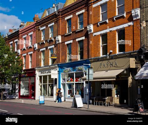 Shops with flats above on Upper Street in Islington London N1 UK which ...