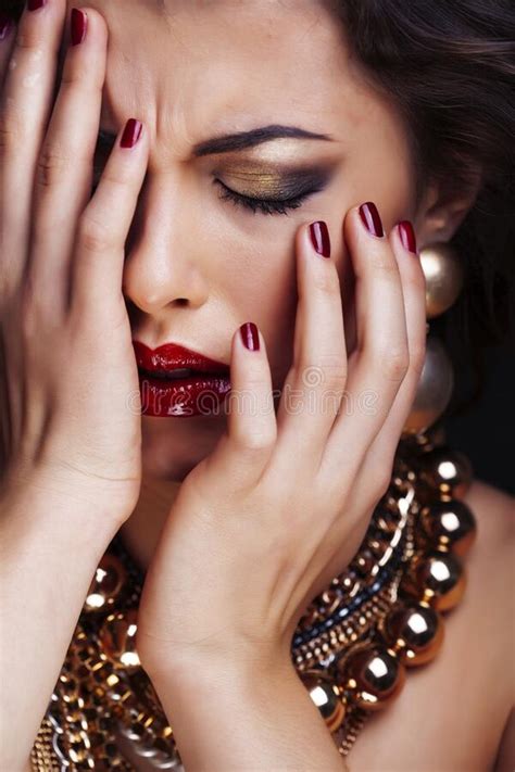 Beauty Rich Brunette Woman With A Lot Of Jewellery Hispanic Curly Lady Posing Very Emotional