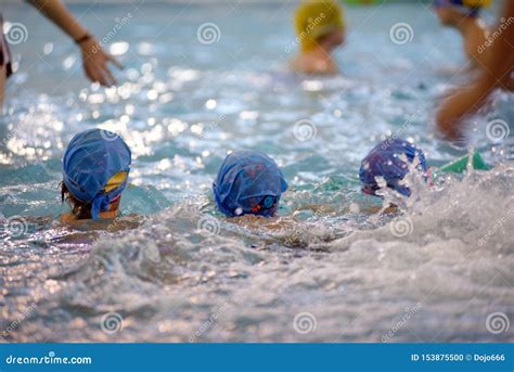 Children Swimming Competition in Pool, Relay Race Stock Photo - Image ...