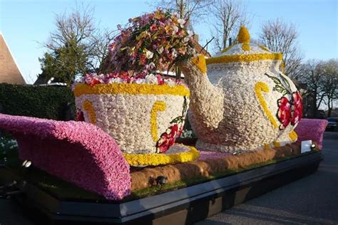 Flower Parade Float Featuring A Teapot With Teacup And Saucer April