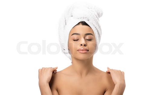Relaxed Naked African American Woman With Closed Eyes And Towel On Head Touching Shoulders