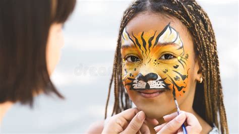 Little Girl Getting Her Face Painted by Face Painting Artist. Stock Image - Image of body, aqua ...