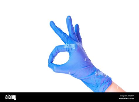 Blue Latex Medical Gloves On A Female Hand Shows The Character Okay