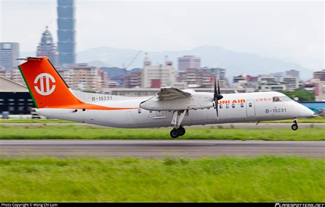 B 15231 UNI Air De Havilland Canada DHC 8 311 Dash 8 Photo By Wong Chi