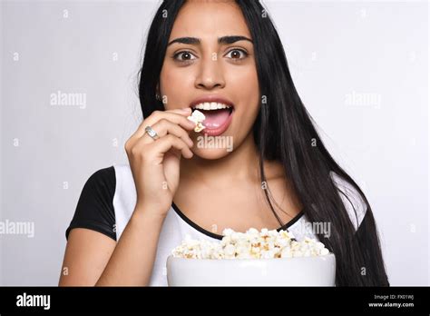 Young Beautiful Woman Eating Popcorn Isolated White Background Stock