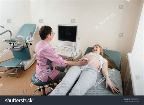 Pregnant Girl Gets Ultrasound Her Abdomen Stock Photo 1679860933 | Shutterstock