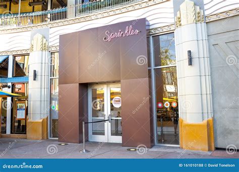 Sprinkles Cupcakes sign editorial stock photo. Image of name - 161010188