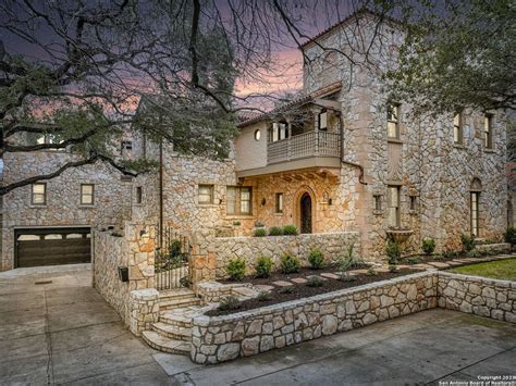 This San Antonio mansion comes with a basement bar-plus-wine cellar and ...