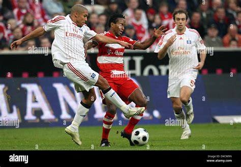 Nigel De Jong Of Hamburg L Challenges Munich S Ze Roberto C In The