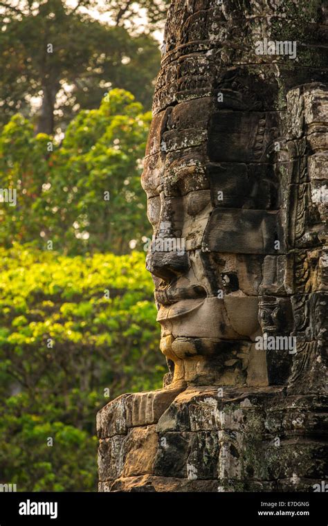 Stone Faces On The Towers Of Ancient Bayon Temple In Angkor Thom